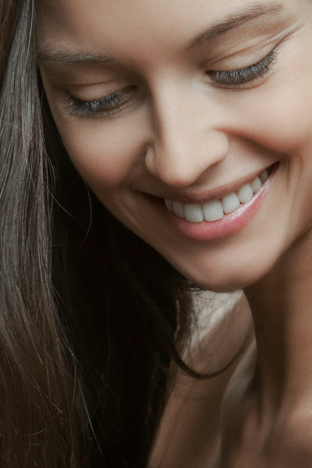 Portrait of a woman in her thirties smiling